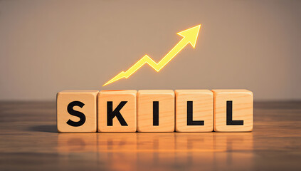 Wooden blocks that spell out "SKILL" with an upward-pointing arrow. Professional development, personal growth, talent management and continuous development, workplace skills.