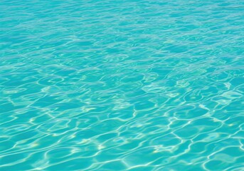 Obraz premium Turquoise Water Ripples With Crystalline Sun Reflections 