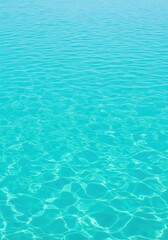 Obraz premium Turquoise Water Ripples With Crystalline Sun Reflections 