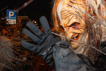 Obraz premium Dobbiaco Krampus Festival: Medieval masks parade through South Tyrol, originating from Northern Europe