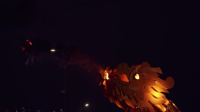 Dragon Bridge in Danang Blasting Intense Flames into Dark Sky during Night Show While Spectators Watch from Below