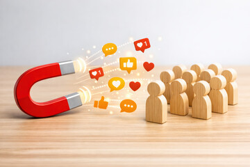 Influence engagement attraction audience connection Magnet imagery showing a red magnet drawing social likes and comments toward a clustered wooden group uplifting mood