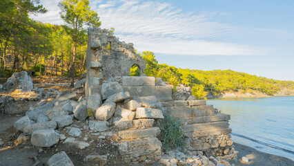 Remains of building walls in the ruins of the ancient city of Phaselis in Lycia in modern Turkey