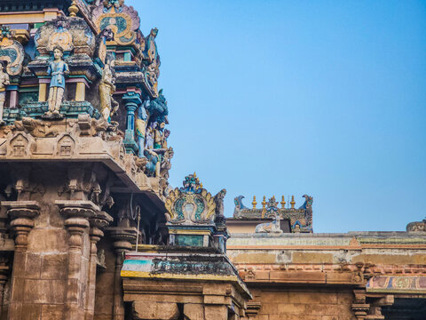 Ancient stone mandapam inside a Hindu temple complex at Thiruvathavur, Madurai, Tamil Nadu, highlighting carved pillars and Dravidian architecture