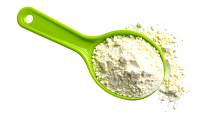 A green scoop holds protein powder, spilling onto a black background