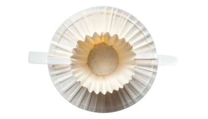 Overhead shot of a coffee filter inside a holder, appearing as an eye