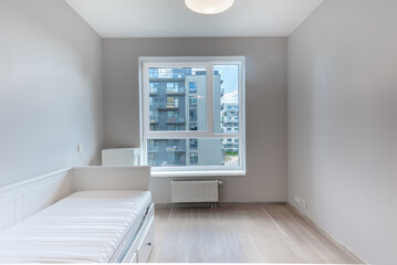 Minimalistic Home Bedroom Interior with Gray Walls and a White Single Bed Frame