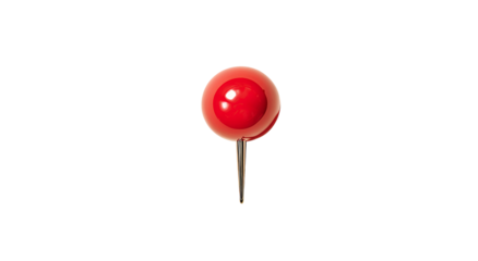 A shiny red pushpin isolated on a stark black background