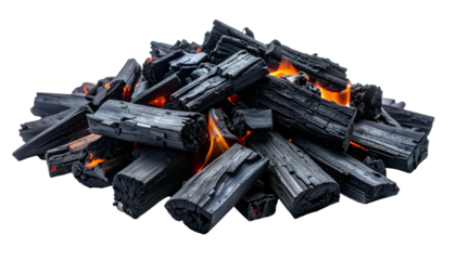 A pile of black, smoldering charcoal with vibrant orange flames peaking through