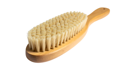 Wooden handled brush with tightly packed bristles, isolated on black background, angled view