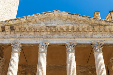 Naklejka premium Temple of Minerva pediment and Corinthian columns, Assisi
