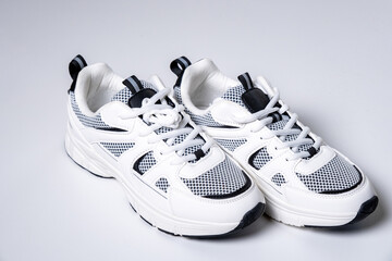 Highquality studio image presenting athletic sneakers with cushioned sole and stylish design...