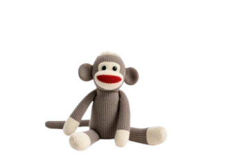 Classic handmade sock monkey stuffed animal toy for nostalgic decor charm