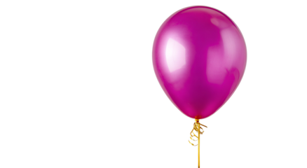A vibrant, magenta balloon floats against a stark black background with a gold ribbon