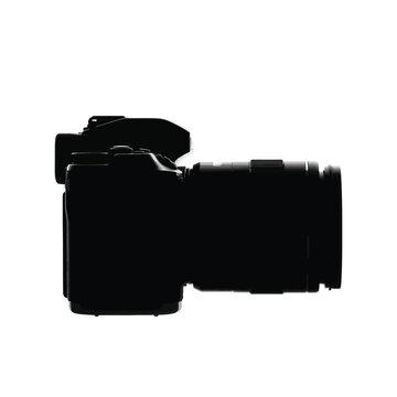 Silhouette of a modern digital camera with a lens