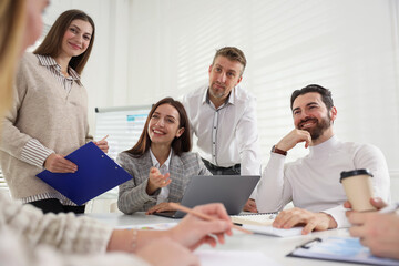 Fototapeta premium Businesspeople working together at table in office