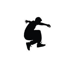 Silhouette of a man in mid-air jump, parkour style. © StockSynergy