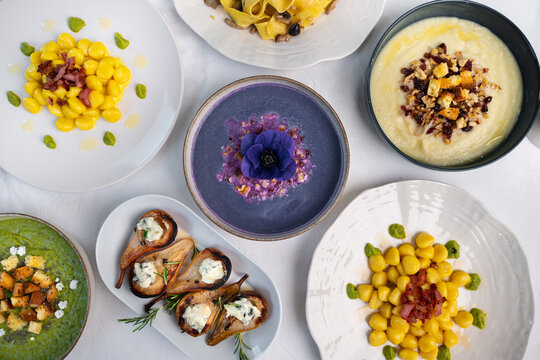 Italian Gourmet Flat Lay with Creative Dishes, Gnocchi, Fresh Pasta and Colorful Soups