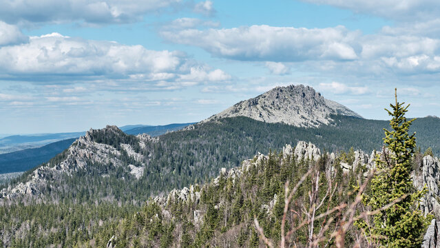 Panoramic view of Mitkinskiye Rocks and Otkliknoy Ridge in Taganay National Park, Russia