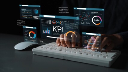 Hands typing on a keyboard with multiple holographic data visualization screens displaying KPIs and data analysis in a modern workspace environment Gluon.