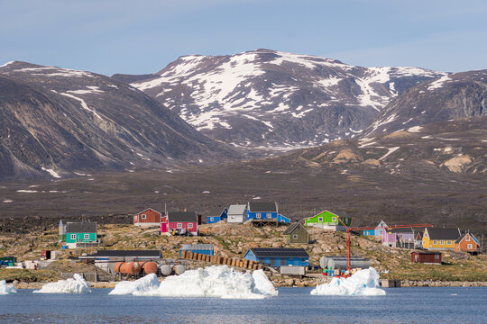 Colorful houses in Greenland with icy landscapes
