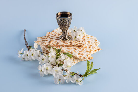 Passover matzah with blossoming flowers and wine