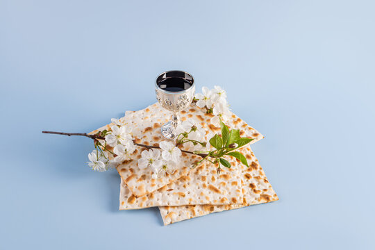 Passover tradition with matzah, wine, and blossoms