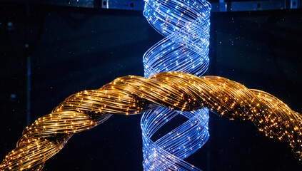 Glowing Blue and Gold Light Spirals Intertwined