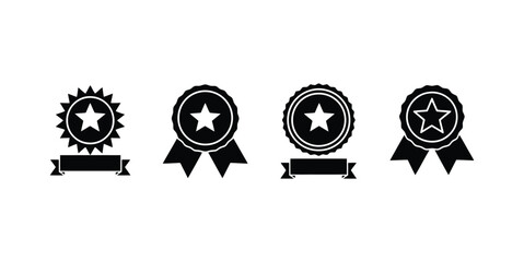 Collection of four black star award ribbons and badges on for recognition and achievement