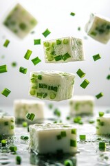 thai steamed layer cake flying with pandan scent, isolated on white background
