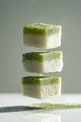 thai steamed layer cake flying with pandan scent, isolated on white background