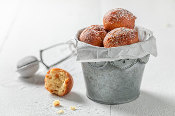 Delicious and sweet mini doughnuts with caster sugar.