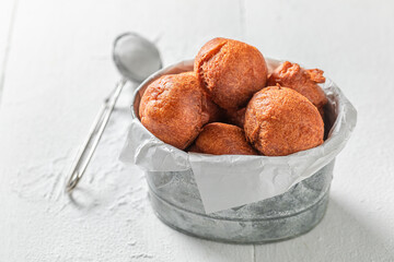 Hot and tasty mini doughnuts as a tasty snack.