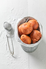 Delicious and sweet mini doughnuts baked at home bakery.