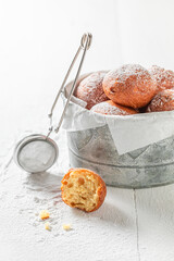 Homemade and fresh mini doughnuts for Fat Thursday in Poland.