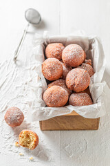 Fresh and sweet mini doughnuts with caster sugar.