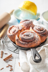 Homemade cinnamon buns as christmas dessert. Popular Swedish dessert.