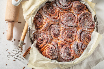 Traditionally cinnamon buns made of butter. Christmas snack.