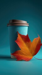 Blue textured coffee cup with autumn leaf maple leaf