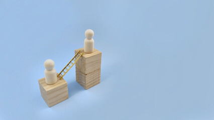 Wooden figures connected by ladder symbolizing guidance, mentoring, support system, teamwork, and leadership concept.