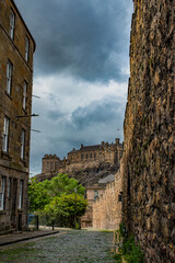 Scotland, Uk: roofs, palaces and the old town skyline with view of Edinburgh Castle seen beyond the Vennel steps, famous passageway between the gables of two buildings off the Grassmarket area