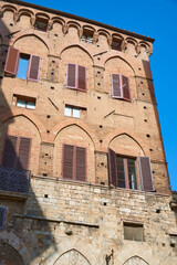 Building facade in Siena, Tuscany, Italy.