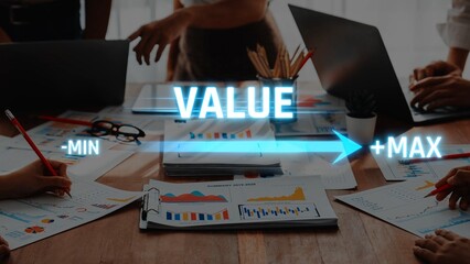 Team of business professionals collaborates on value metrics using charts and graphs, showcasing performance analysis at a modern workspace for better decision-making. Raster