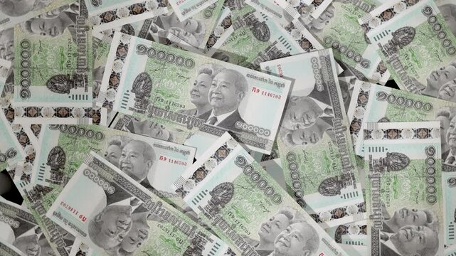 Top View 3D Animation of Scattered Cambodian Riel Banknotes on Floor, Rotating and Zooming Camera, Realistic Paper Money Cash Motion, Financial Economy Concept, 4K UHD Stock Video