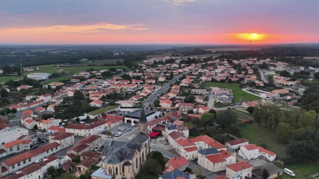 Aerial View Of A Quaint European Village At Sunset, Mache, France