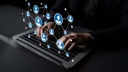 A person types on a laptop, surrounded by visual representations of social network connections, reflecting the concept of digital communication and collaboration. Tessel
