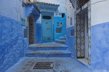 Narrow, stepped, pedestrian passageway linking the different levels of the medina, painted as is customary in shades of blue. Chefchaouen-Morocco-024