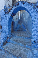 Narrow, stepped, sloping passageway linking different levels in the medina, painted as is customary in various shades of blue. Chefchaouen-Morocco-030