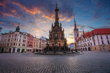 Olomouc, Czech Republic. Cityscape image of downtown Olomouc, Czech Republic with Olomouc City Hall and Honorary Holy Trinity Column at summer sunrise.