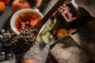 Dark food: herbal tea in a cup. Clipart photo